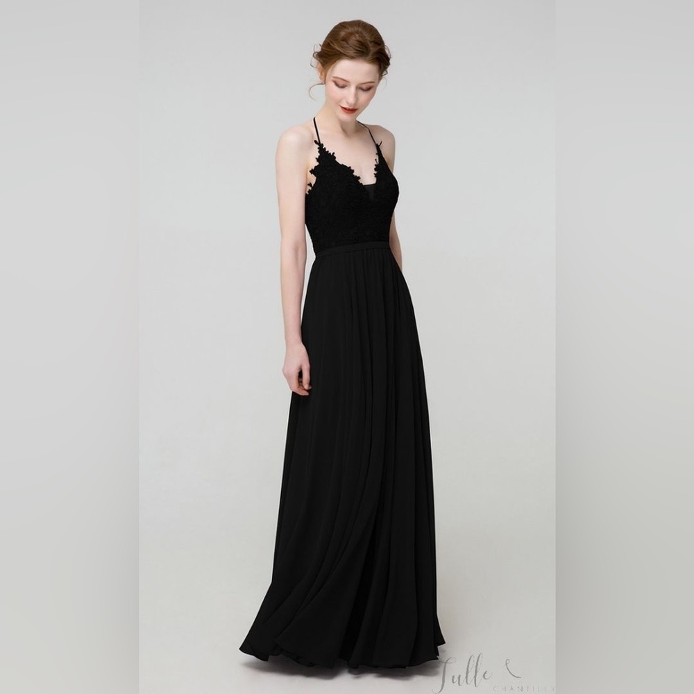 Black lace halter dress, long with side slit.